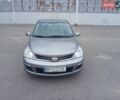 Серый Ниссан Тиида, объемом двигателя 1.6 л и пробегом 101 тыс. км за 7200 $, фото 1 на Automoto.ua