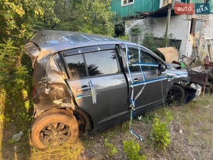 Сірий Ніссан Тііда, об'ємом двигуна 1.6 л та пробігом 260 тис. км за 2500 $, фото 1 на Automoto.ua