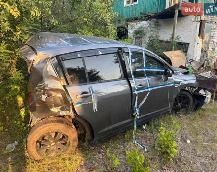 Сірий Ніссан Тііда, об'ємом двигуна 1.6 л та пробігом 260 тис. км за 2500 $, фото 1 на Automoto.ua