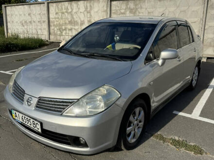 Сірий Ніссан Тііда, об'ємом двигуна 1.6 л та пробігом 312 тис. км за 4700 $, фото 1 на Automoto.ua