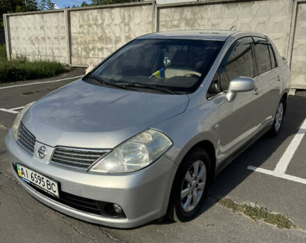 Серый Ниссан Тиида, объемом двигателя 1.6 л и пробегом 312 тыс. км за 4700 $, фото 1 на Automoto.ua