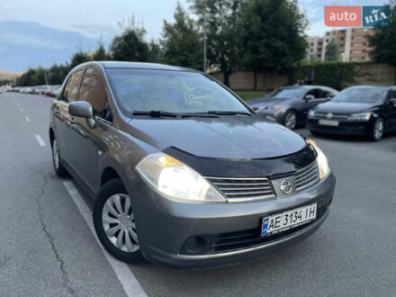 Сірий Ніссан Тііда, об'ємом двигуна 1.6 л та пробігом 250 тис. км за 4650 $, фото 1 на Automoto.ua