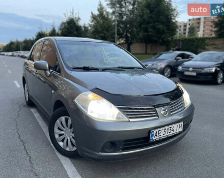 Сірий Ніссан Тііда, об'ємом двигуна 1.6 л та пробігом 250 тис. км за 4650 $, фото 1 на Automoto.ua