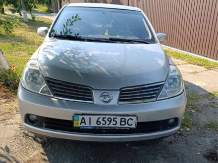 Сірий Ніссан Тііда, об'ємом двигуна 1.6 л та пробігом 311 тис. км за 4700 $, фото 1 на Automoto.ua