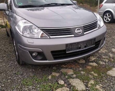 Серый Ниссан Тиида, объемом двигателя 1.8 л и пробегом 206 тыс. км за 4200 $, фото 1 на Automoto.ua