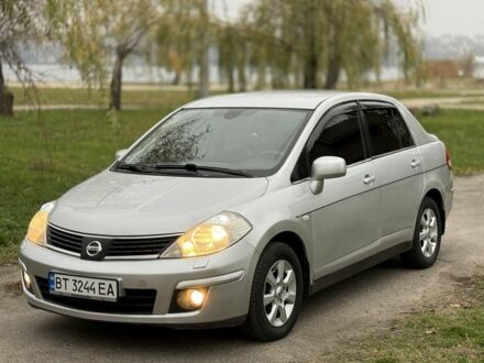 Сірий Ніссан Тііда, об'ємом двигуна 1.6 л та пробігом 199 тис. км за 5800 $, фото 1 на Automoto.ua