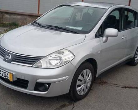 Серый Ниссан Тиида, объемом двигателя 1.6 л и пробегом 198 тыс. км за 7200 $, фото 1 на Automoto.ua