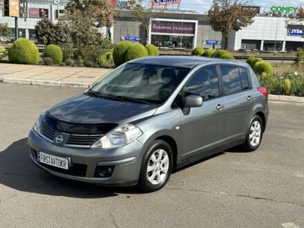 Серый Ниссан Тиида, объемом двигателя 1.8 л и пробегом 182 тыс. км за 5200 $, фото 1 на Automoto.ua