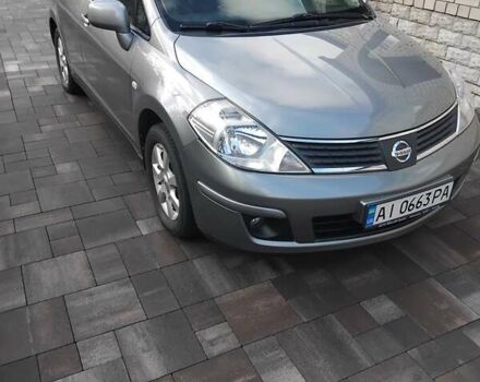 Серый Ниссан Тиида, объемом двигателя 1.6 л и пробегом 210 тыс. км за 6000 $, фото 1 на Automoto.ua