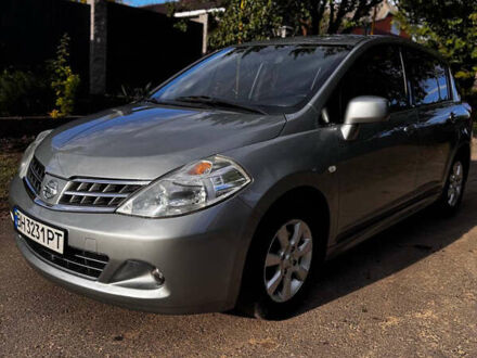 Серый Ниссан Тиида, объемом двигателя 1.6 л и пробегом 170 тыс. км за 6500 $, фото 1 на Automoto.ua