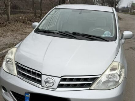 Серый Ниссан Тиида, объемом двигателя 1.5 л и пробегом 93 тыс. км за 7000 $, фото 1 на Automoto.ua