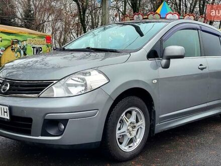 Серый Ниссан Тиида, объемом двигателя 1.6 л и пробегом 199 тыс. км за 5390 $, фото 1 на Automoto.ua