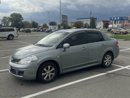 Серый Ниссан Тиида, объемом двигателя 1.6 л и пробегом 159 тыс. км за 6800 $, фото 1 на Automoto.ua