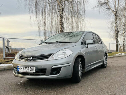 Ніссан Тііда 2011 у Ромнах на Automoto.ua Сірий Ніссан Тііда, об'ємом двигуна 1.6 л та пробігом 150 тис. км за 6400 $, фото 1 на Automoto.ua