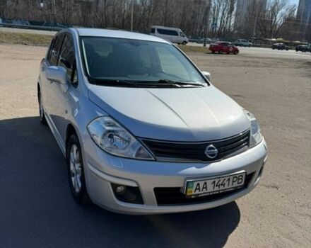 Серый Ниссан Тиида, объемом двигателя 1.6 л и пробегом 133 тыс. км за 7000 $, фото 1 на Automoto.ua