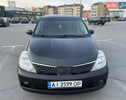 Синий Ниссан Тиида, объемом двигателя 1.5 л и пробегом 221 тыс. км за 3450 $, фото 4 на Automoto.ua