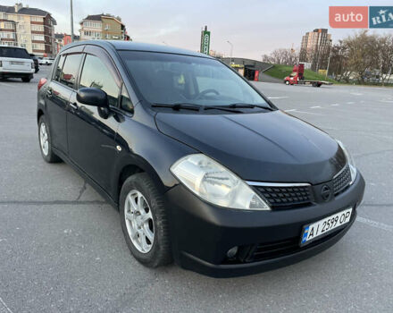 Синий Ниссан Тиида, объемом двигателя 1.5 л и пробегом 221 тыс. км за 3450 $, фото 1 на Automoto.ua