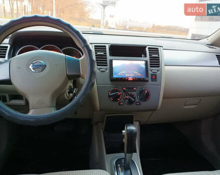 Синий Ниссан Тиида, объемом двигателя 1.6 л и пробегом 173 тыс. км за 5499 $, фото 7 на Automoto.ua