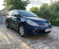 Синий Ниссан Тиида, объемом двигателя 1.6 л и пробегом 142 тыс. км за 7671 $, фото 1 на Automoto.ua