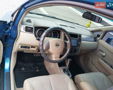 Синий Ниссан Тиида, объемом двигателя 1.6 л и пробегом 173 тыс. км за 5499 $, фото 6 на Automoto.ua