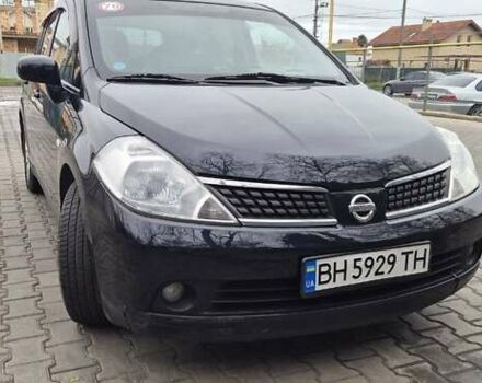 Синий Ниссан Тиида, объемом двигателя 1.6 л и пробегом 209 тыс. км за 5800 $, фото 1 на Automoto.ua