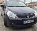 Синий Ниссан Тиида, объемом двигателя 1.6 л и пробегом 209 тыс. км за 5800 $, фото 1 на Automoto.ua