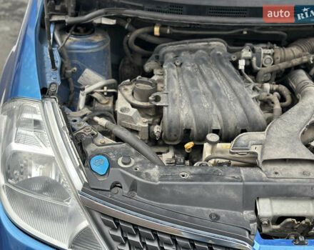 Синий Ниссан Тиида, объемом двигателя 1.6 л и пробегом 172 тыс. км за 6200 $, фото 24 на Automoto.ua