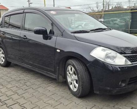 Синий Ниссан Тиида, объемом двигателя 1.6 л и пробегом 209 тыс. км за 5800 $, фото 2 на Automoto.ua