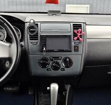 Синий Ниссан Тиида, объемом двигателя 1.6 л и пробегом 209 тыс. км за 5800 $, фото 15 на Automoto.ua