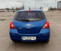 Синий Ниссан Тиида, объемом двигателя 1.6 л и пробегом 243 тыс. км за 5800 $, фото 4 на Automoto.ua