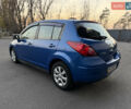 Синий Ниссан Тиида, объемом двигателя 1.6 л и пробегом 210 тыс. км за 6300 $, фото 4 на Automoto.ua