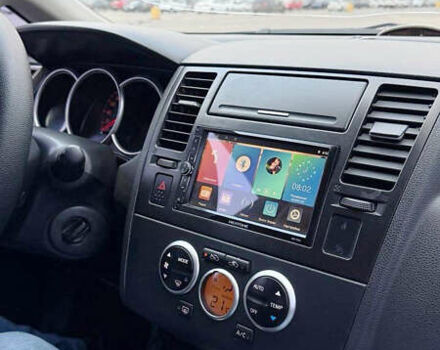 Синий Ниссан Тиида, объемом двигателя 1.6 л и пробегом 243 тыс. км за 5800 $, фото 13 на Automoto.ua