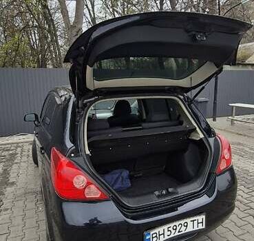 Синий Ниссан Тиида, объемом двигателя 1.6 л и пробегом 209 тыс. км за 5800 $, фото 4 на Automoto.ua