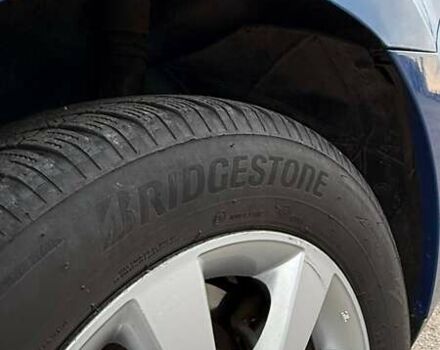 Синий Ниссан Тиида, объемом двигателя 1.6 л и пробегом 243 тыс. км за 5800 $, фото 7 на Automoto.ua