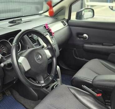 Синий Ниссан Тиида, объемом двигателя 1.6 л и пробегом 209 тыс. км за 5800 $, фото 21 на Automoto.ua