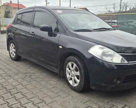 Синий Ниссан Тиида, объемом двигателя 1.6 л и пробегом 209 тыс. км за 5800 $, фото 3 на Automoto.ua