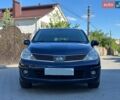 Синий Ниссан Тиида, объемом двигателя 1.6 л и пробегом 214 тыс. км за 6500 $, фото 1 на Automoto.ua
