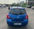 Синий Ниссан Тиида, объемом двигателя 1.6 л и пробегом 290 тыс. км за 6250 $, фото 2 на Automoto.ua