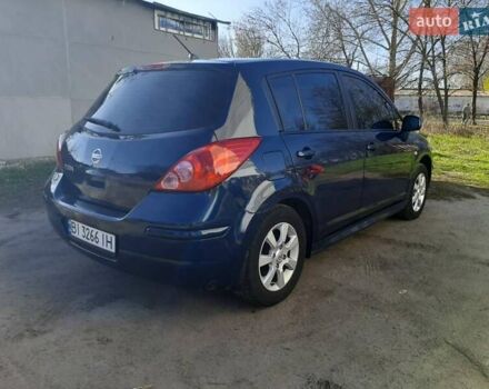 Синий Ниссан Тиида, объемом двигателя 1.6 л и пробегом 187 тыс. км за 7300 $, фото 4 на Automoto.ua