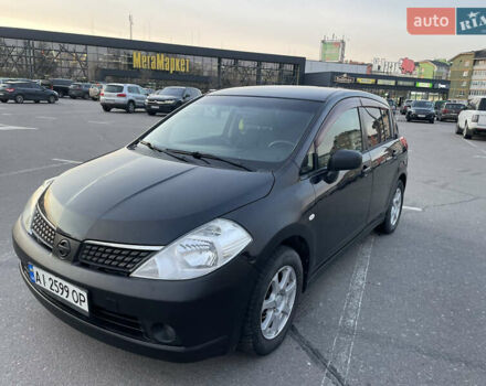 Синий Ниссан Тиида, объемом двигателя 1.5 л и пробегом 221 тыс. км за 3450 $, фото 1 на Automoto.ua