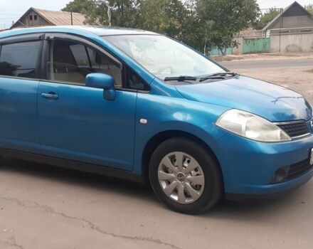 Синий Ниссан Тиида, объемом двигателя 1.6 л и пробегом 260 тыс. км за 5700 $, фото 1 на Automoto.ua