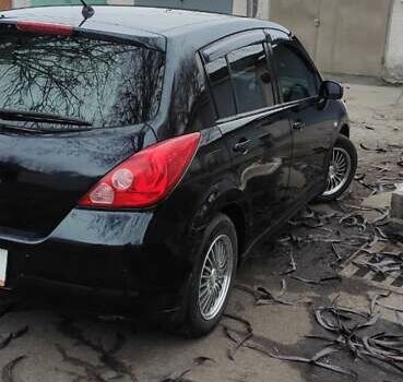 Синий Ниссан Тиида, объемом двигателя 1.6 л и пробегом 107 тыс. км за 5850 $, фото 1 на Automoto.ua