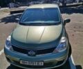 Зеленый Ниссан Тиида, объемом двигателя 1.6 л и пробегом 106 тыс. км за 5200 $, фото 1 на Automoto.ua