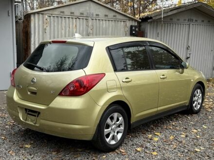 Зеленый Ниссан Тиида, объемом двигателя 1.6 л и пробегом 174 тыс. км за 7450 $, фото 1 на Automoto.ua