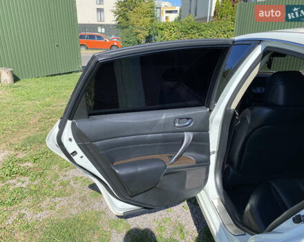 Белый Ниссан Теана, объемом двигателя 2.5 л и пробегом 244 тыс. км за 11300 $, фото 14 на Automoto.ua