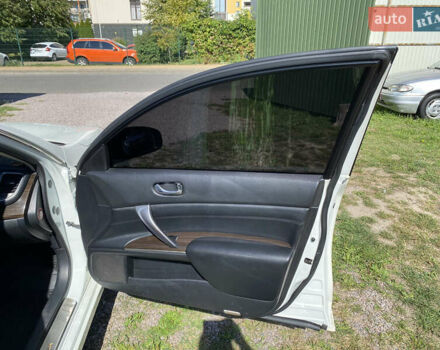 Белый Ниссан Теана, объемом двигателя 2.5 л и пробегом 244 тыс. км за 11300 $, фото 20 на Automoto.ua