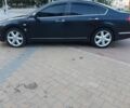 Черный Ниссан Теана, объемом двигателя 2.3 л и пробегом 330 тыс. км за 6800 $, фото 2 на Automoto.ua