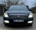 Черный Ниссан Теана, объемом двигателя 2.3 л и пробегом 334 тыс. км за 5500 $, фото 1 на Automoto.ua
