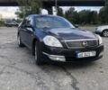 Черный Ниссан Теана, объемом двигателя 2 л и пробегом 209 тыс. км за 4000 $, фото 1 на Automoto.ua