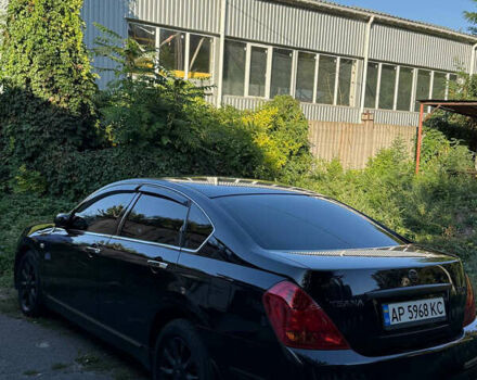 Черный Ниссан Теана, объемом двигателя 2.3 л и пробегом 225 тыс. км за 5500 $, фото 2 на Automoto.ua